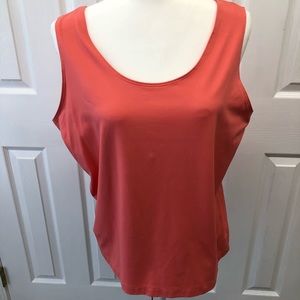 Chico’s orange tank top.